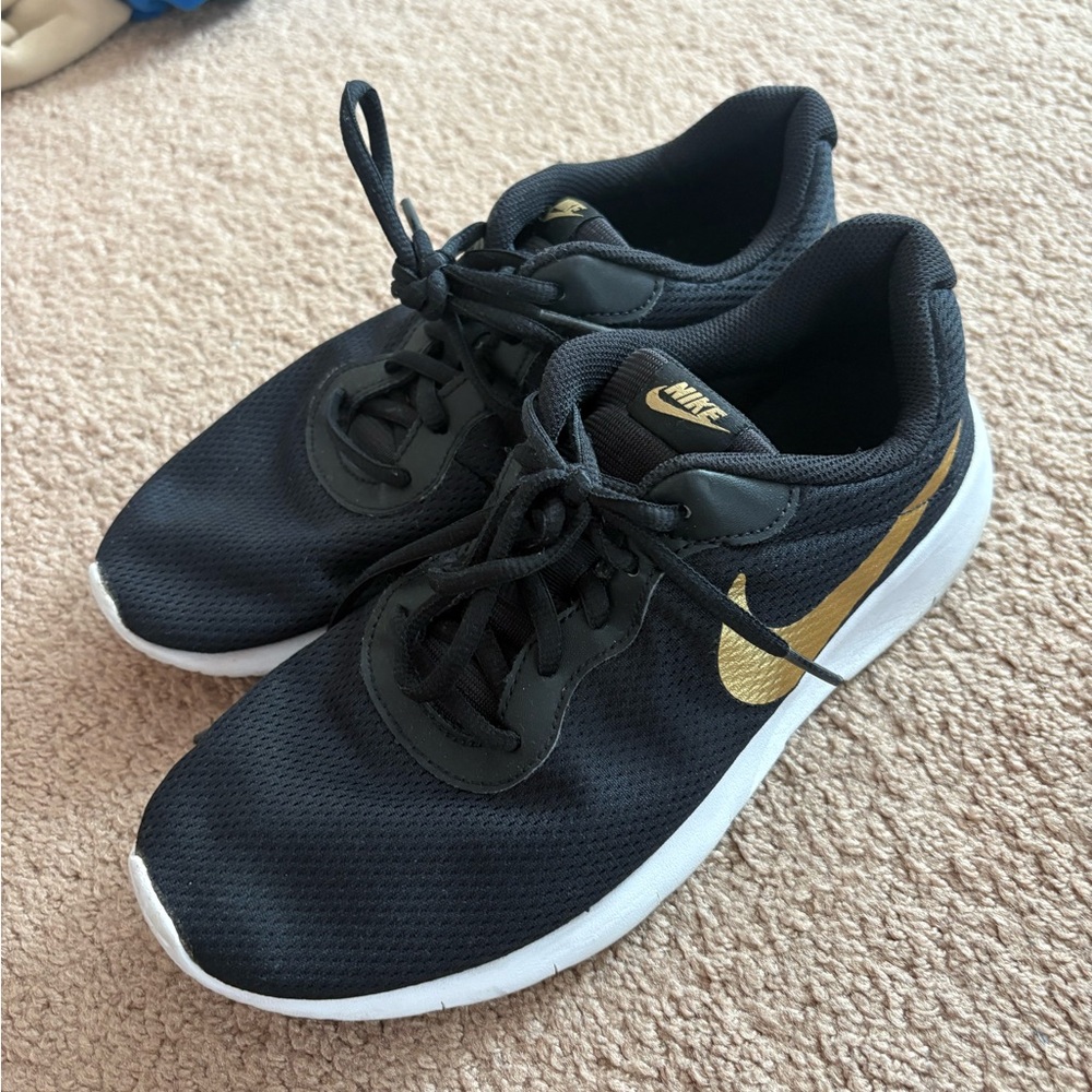 Nike Black and Gold Athletic Shoes